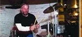Stevie playing a drum kit